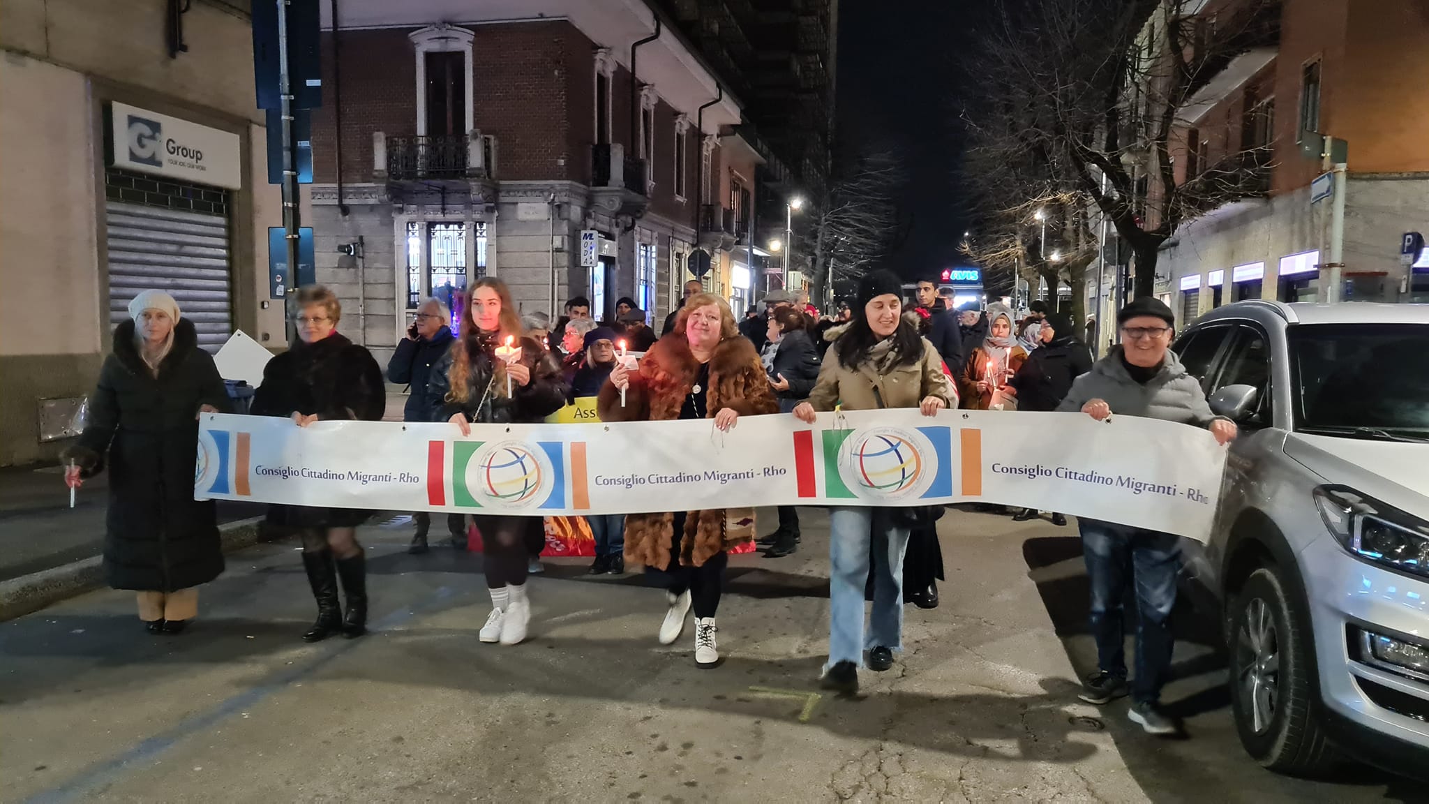 fiaccolata pace rho